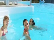 Three babes one lucky guy in pool