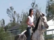 Chick from Thailand riding a horse