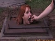 A cute redhead slave tortured outside