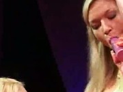 Two strippers with big tits licking pussy on stage