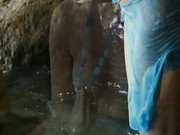 Striptease and shaved pussy in the sea