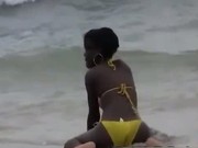 Hot ebony in bikini bathing on the beach 5 by EbonyExposed