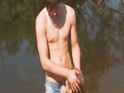 Slim babe wathes half naked boy fishing