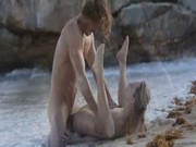 Sexy couple make love on the beach