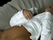 Blonde woman in white shirt masturbating