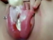 Babe with swollen pussy inserts ice cream