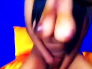 Busty black beauty toying her pussy