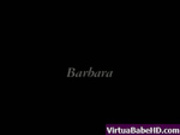 Barbara masturbating in a bath with a dildo