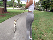 Diamond Kitty is walking with her dog and flashing her giant glutes